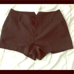Black flat front shorts